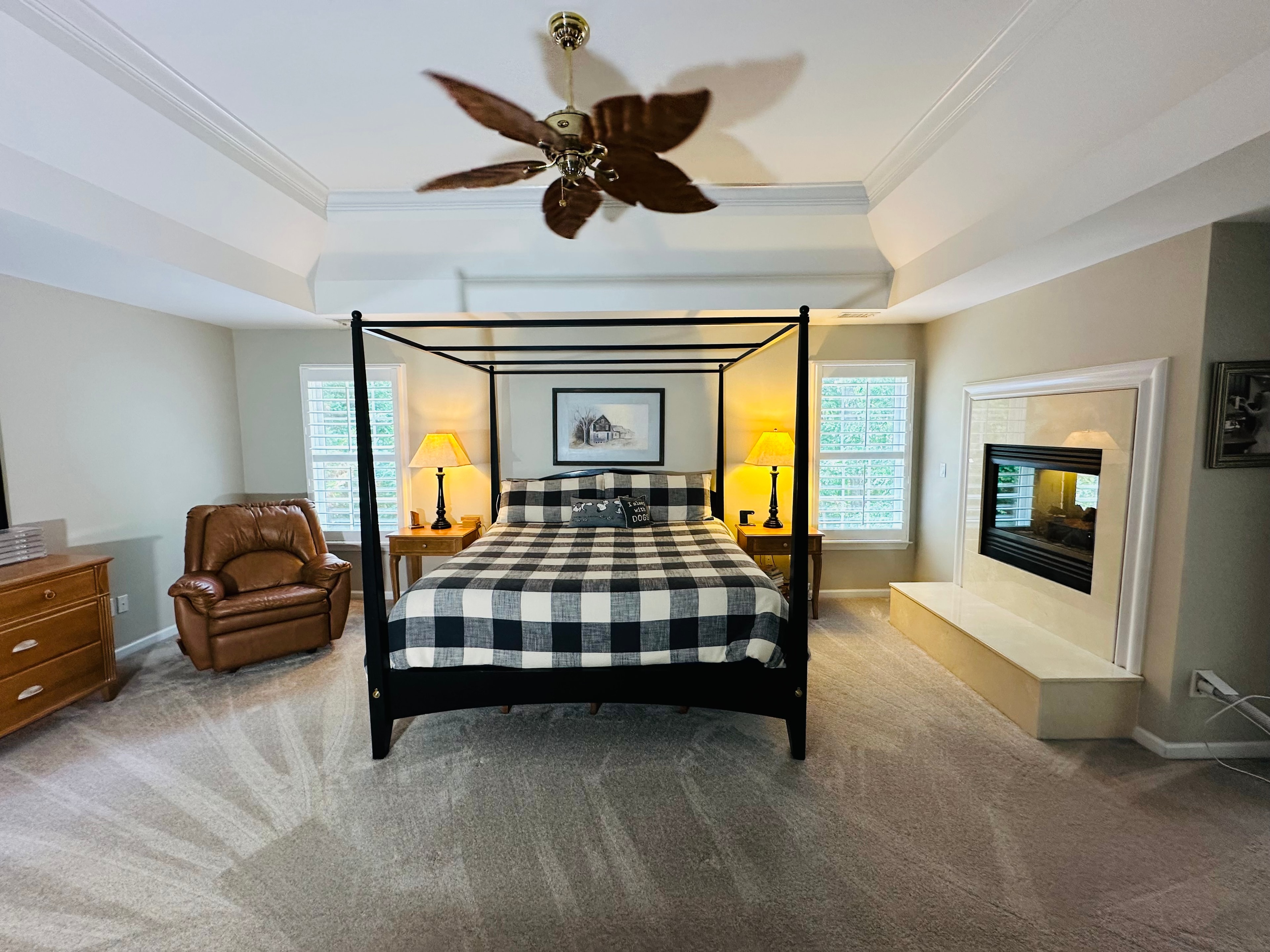 Elegant master bedroom with soft lighting